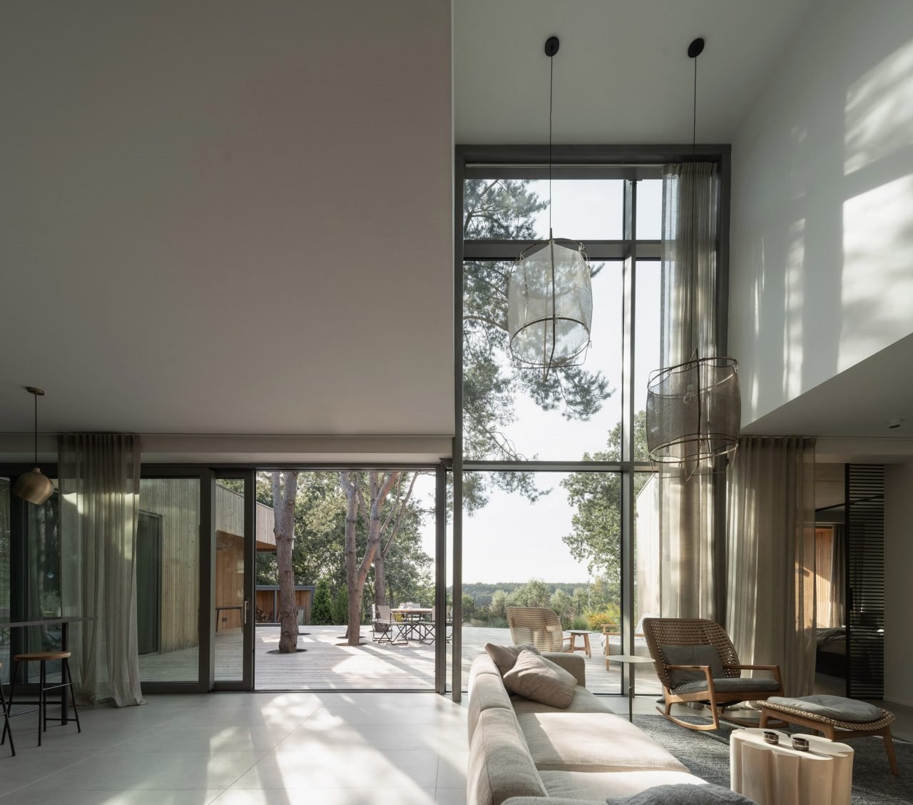 A rhythm of identical window openings repeating down a long wall